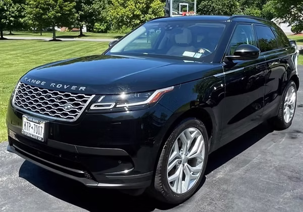 Freshly detailed Range Rover Velar in a driveway after premium mobile service in Rochester, NY